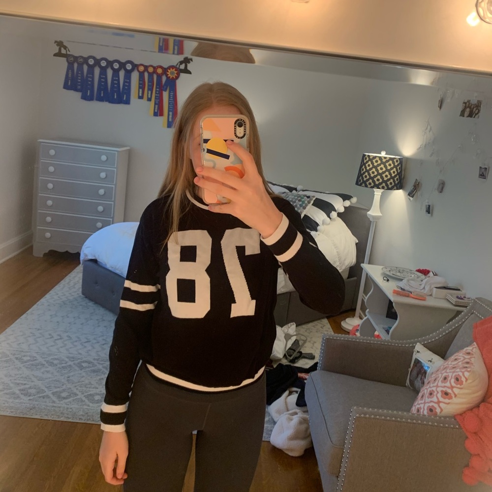 Black and white #78 varsity sweater.